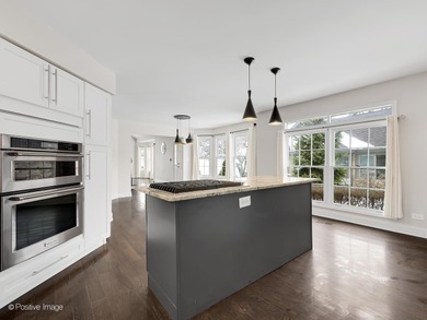 Custom Gated Living: Sunny End-Unit with Expanded Dining Welcome on Crystal Tree Golf and Country Club in Illinois - for sale on GolfHomes.com, golf home, golf lot