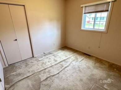 Location, location, location! This single-level home sits on a on Miles City Town and Country Club in Montana - for sale on GolfHomes.com, golf home, golf lot