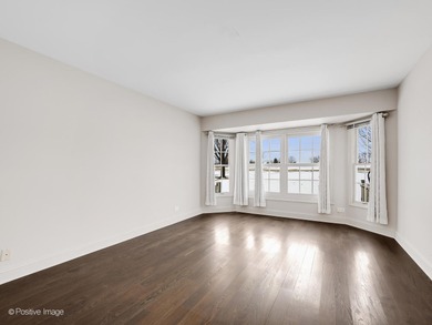 Custom Gated Living: Sunny End-Unit with Expanded Dining Welcome on Crystal Tree Golf and Country Club in Illinois - for sale on GolfHomes.com, golf home, golf lot