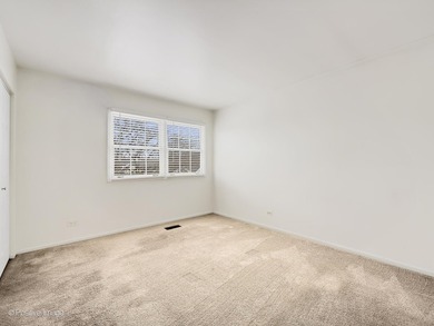 Custom Gated Living: Sunny End-Unit with Expanded Dining Welcome on Crystal Tree Golf and Country Club in Illinois - for sale on GolfHomes.com, golf home, golf lot