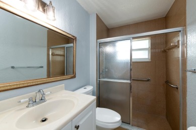 GORGEOUS, UPDATED, SKYLIGHTS, FANS, FRESHLY PAINTED, SCREENED on Forest Oaks Golf Club in Florida - for sale on GolfHomes.com, golf home, golf lot