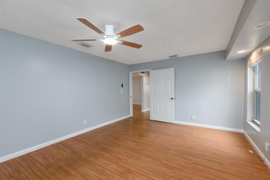 GORGEOUS, UPDATED, SKYLIGHTS, FANS, FRESHLY PAINTED, SCREENED on Forest Oaks Golf Club in Florida - for sale on GolfHomes.com, golf home, golf lot