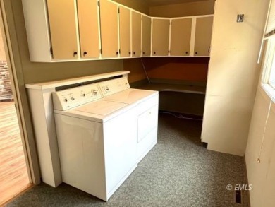 Location, location, location! This single-level home sits on a on Miles City Town and Country Club in Montana - for sale on GolfHomes.com, golf home, golf lot