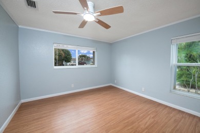GORGEOUS, UPDATED, SKYLIGHTS, FANS, FRESHLY PAINTED, SCREENED on Forest Oaks Golf Club in Florida - for sale on GolfHomes.com, golf home, golf lot