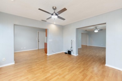 GORGEOUS, UPDATED, SKYLIGHTS, FANS, FRESHLY PAINTED, SCREENED on Forest Oaks Golf Club in Florida - for sale on GolfHomes.com, golf home, golf lot