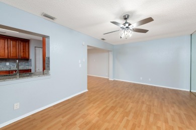 GORGEOUS, UPDATED, SKYLIGHTS, FANS, FRESHLY PAINTED, SCREENED on Forest Oaks Golf Club in Florida - for sale on GolfHomes.com, golf home, golf lot