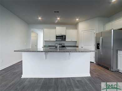 FRESH PAINT, NEW CARPETS, NEW ROOF!! This beautiful 4-bedroom on Sterling Links Golf Club in Georgia - for sale on GolfHomes.com, golf home, golf lot