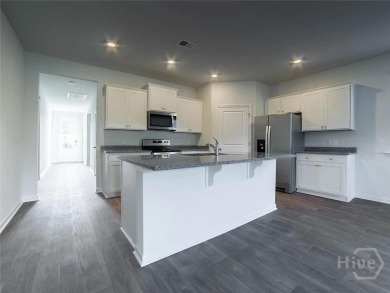 This beautiful 4-bedroom, 3-bath home features a fantastic open on Sterling Links Golf Club in Georgia - for sale on GolfHomes.com, golf home, golf lot