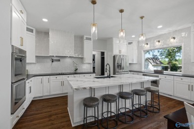 Check out this stunningly remodeled home, where modern upgrades on Point Mallard Golf Course in Alabama - for sale on GolfHomes.com, golf home, golf lot