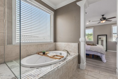 This pool home has new paint throughout the interior, custom on Verrado Golf Club  in Arizona - for sale on GolfHomes.com, golf home, golf lot