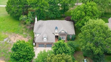 Situated on the 18th hole of the golf course in The Coves at on The Coves Golf Course in Oklahoma - for sale on GolfHomes.com, golf home, golf lot