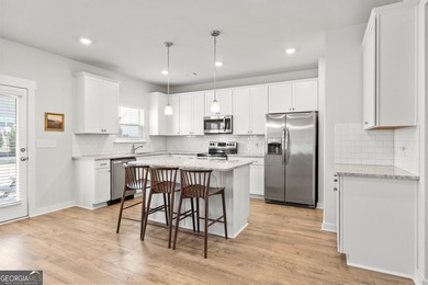 Welcome Home! Built in 2022 and located in the desirable on Traditions of Braselton Golf Club in Georgia - for sale on GolfHomes.com, golf home, golf lot