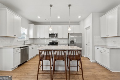 Welcome Home! Built in 2022 and located in the desirable on Traditions of Braselton Golf Club in Georgia - for sale on GolfHomes.com, golf home, golf lot