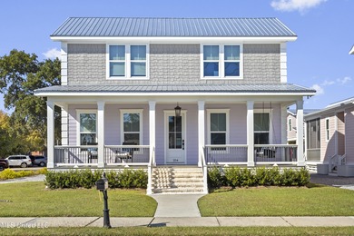 Your Perfect Coastal retreat! Steps from the beach, and easy on Pass Christian Isles Golf Club in Mississippi - for sale on GolfHomes.com, golf home, golf lot