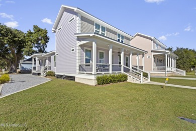 Your Perfect Coastal retreat! Steps from the beach, and easy on Pass Christian Isles Golf Club in Mississippi - for sale on GolfHomes.com, golf home, golf lot