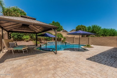 This pool home has new paint throughout the interior, custom on Verrado Golf Club  in Arizona - for sale on GolfHomes.com, golf home, golf lot