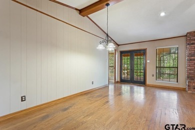 This home has so much potential and offers an affordable entry on Hide-A-Way Lake Golf Course in Texas - for sale on GolfHomes.com, golf home, golf lot
