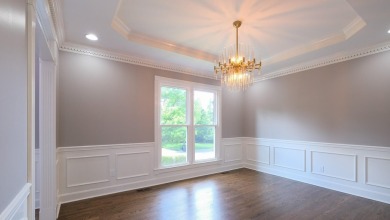 This Andover Forest brick home on a finished basement is full of on Andover Golf and Country Club in Kentucky - for sale on GolfHomes.com, golf home, golf lot