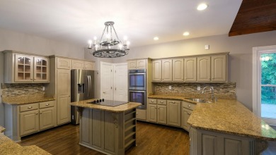 This Andover Forest brick home on a finished basement is full of on Andover Golf and Country Club in Kentucky - for sale on GolfHomes.com, golf home, golf lot