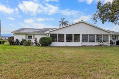 What an opportunity to own a 2 bedroom 2 bath home in a world on Falcon Watch Golf Club in Florida - for sale on GolfHomes.com, golf home, golf lot