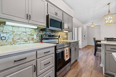 LAKEFRONT with a VIEW. Vaulted ceiling. Skylight in kitchen on Isabella Golf Course  in Arkansas - for sale on GolfHomes.com, golf home, golf lot