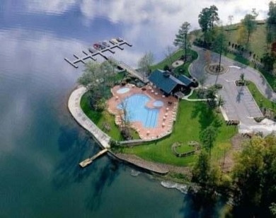 Lakefront Living at Its Finest - Nestled on a picturesque 1-acre on The Patriot Golf Club At Grand Harbor in South Carolina - for sale on GolfHomes.com, golf home, golf lot
