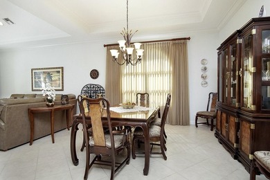 LAKEFRONT POOL HOME THAT OFFERS GREAT PRIVACY AND GREENSPACE! on The Legacy Golf and Tennis Club in Florida - for sale on GolfHomes.com, golf home, golf lot