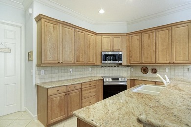 LAKEFRONT POOL HOME THAT OFFERS GREAT PRIVACY AND GREENSPACE! on The Legacy Golf and Tennis Club in Florida - for sale on GolfHomes.com, golf home, golf lot