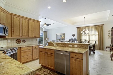 LAKEFRONT POOL HOME THAT OFFERS GREAT PRIVACY AND GREENSPACE! on The Legacy Golf and Tennis Club in Florida - for sale on GolfHomes.com, golf home, golf lot