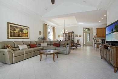 LAKEFRONT POOL HOME THAT OFFERS GREAT PRIVACY AND GREENSPACE! on The Legacy Golf and Tennis Club in Florida - for sale on GolfHomes.com, golf home, golf lot