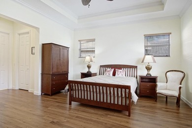 LAKEFRONT POOL HOME THAT OFFERS GREAT PRIVACY AND GREENSPACE! on The Legacy Golf and Tennis Club in Florida - for sale on GolfHomes.com, golf home, golf lot