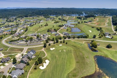 Come build your dream home in a premier gated golf and lakefront on Tennessee National Golf Club in Tennessee - for sale on GolfHomes.com, golf home, golf lot