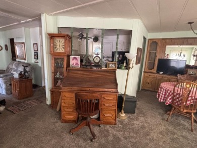 2 bedroom 2 bath mobile home located in the lovely suburban area on Sherwood Forest Golf Club in California - for sale on GolfHomes.com, golf home, golf lot