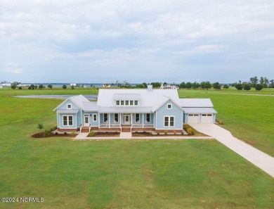 Custom home! Located in the stunning gated community of Occano on Occano Golf Course in North Carolina - for sale on GolfHomes.com, golf home, golf lot