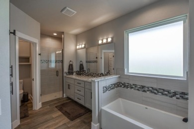 Newly constructed right side of a duplex. Can be bought on Slick Rock Golf Course - Horseshoe Bay in Texas - for sale on GolfHomes.com, golf home, golf lot