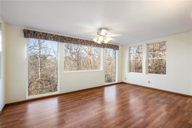 Experience Bella Vista in this inviting *2*-bed, 2-bath home on Bella Vista Country Club - Scottsdale in Arkansas - for sale on GolfHomes.com, golf home, golf lot