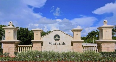 This rarely available end unit with 3 bedrooms and 2 baths has on Vineyards Golf and Country Club in Florida - for sale on GolfHomes.com, golf home, golf lot