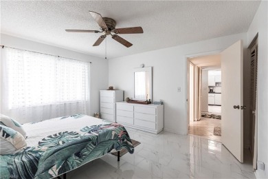 Immaculately Maintained 2 Bed, 2 Bath Condo in Glades Golf and on The Glades Golf and Country Club in Florida - for sale on GolfHomes.com, golf home, golf lot