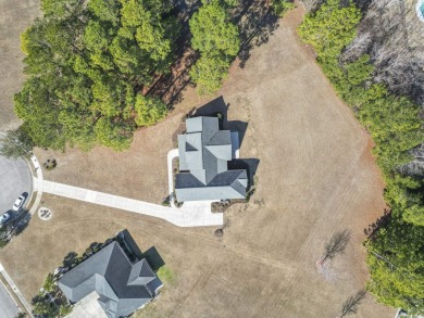 This stunning custom farmhouse-style home sits on a spacious 0 on Wild Wing Plantation in South Carolina - for sale on GolfHomes.com, golf home, golf lot