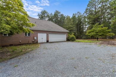 Nestled in the serene Foxfire Village, this charming 2,270 on Foxfire Golf and Country Club in North Carolina - for sale on GolfHomes.com, golf home, golf lot