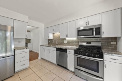 Step inside this stylish 2-bedroom, 1-bathroom condo and fall in on Maple Meadows Golf Club in Illinois - for sale on GolfHomes.com, golf home, golf lot
