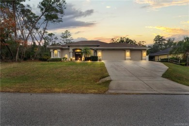Situated on the 4th fairway of Oak Hills Golf Course, this on Oak Hills Country Club in Florida - for sale on GolfHomes.com, golf home, golf lot
