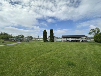 Build your new home on this lot in Lakes of the Four Seasons! on Lakes of the Four Seasons Country Club in Indiana - for sale on GolfHomes.com, golf home, golf lot