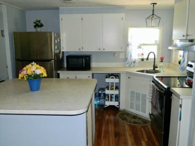 This 1984 Sherman home is 24x40 offering you 960 sq ft of open on Grasslands Golf and Country Club in Florida - for sale on GolfHomes.com, golf home, golf lot