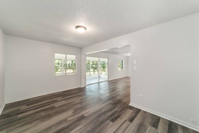 PRICE REDUCED on this freshly renovated oversized corner unit on Country Club At Silver Springs Shores in Florida - for sale on GolfHomes.com, golf home, golf lot