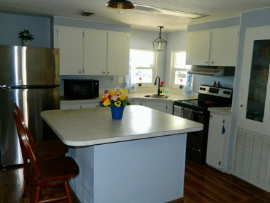 This 1984 Sherman home is 24x40 offering you 960 sq ft of open on Grasslands Golf and Country Club in Florida - for sale on GolfHomes.com, golf home, golf lot