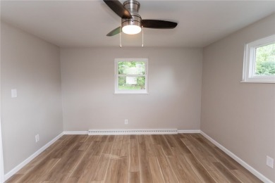 Tastefully remodeled 3 bedroom 2 bath ranch home in a desirable on Uniontown Country Club in Pennsylvania - for sale on GolfHomes.com, golf home, golf lot