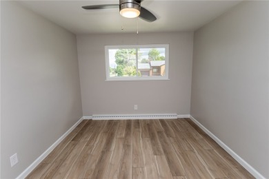 Tastefully remodeled 3 bedroom 2 bath ranch home in a desirable on Uniontown Country Club in Pennsylvania - for sale on GolfHomes.com, golf home, golf lot