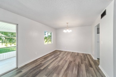 PRICE REDUCED on this freshly renovated oversized corner unit on Country Club At Silver Springs Shores in Florida - for sale on GolfHomes.com, golf home, golf lot