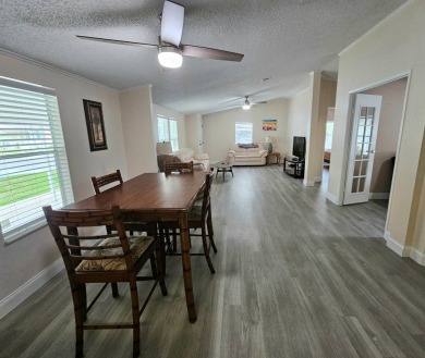 Located in a 55+ MH resort-style community where age on Big Cypress Golf and Country Club in Florida - for sale on GolfHomes.com, golf home, golf lot